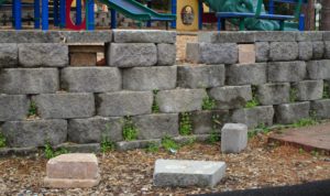 crumbling playground wall